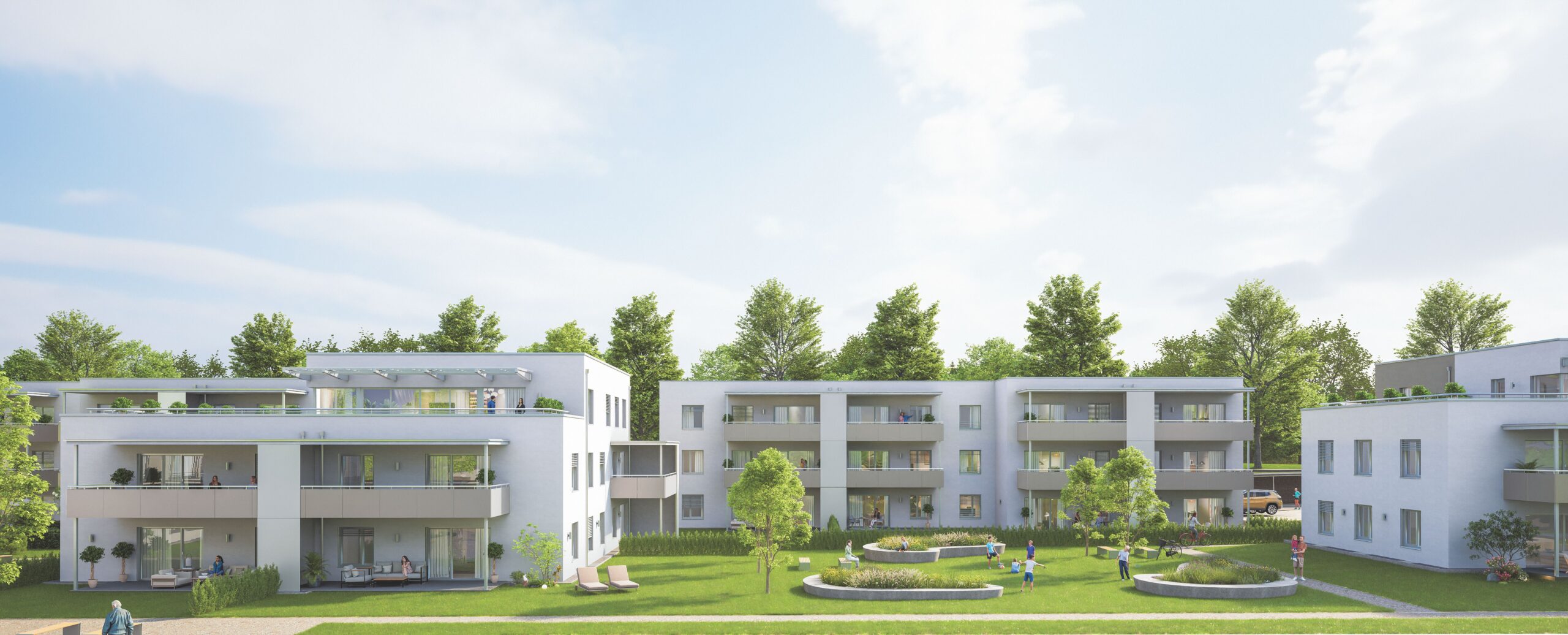 Rendering eines Wohnbaus im Grünen.